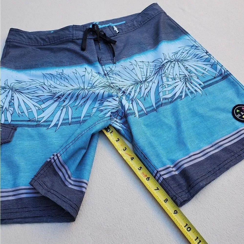 Maui and Sons blue gray and black board shorts